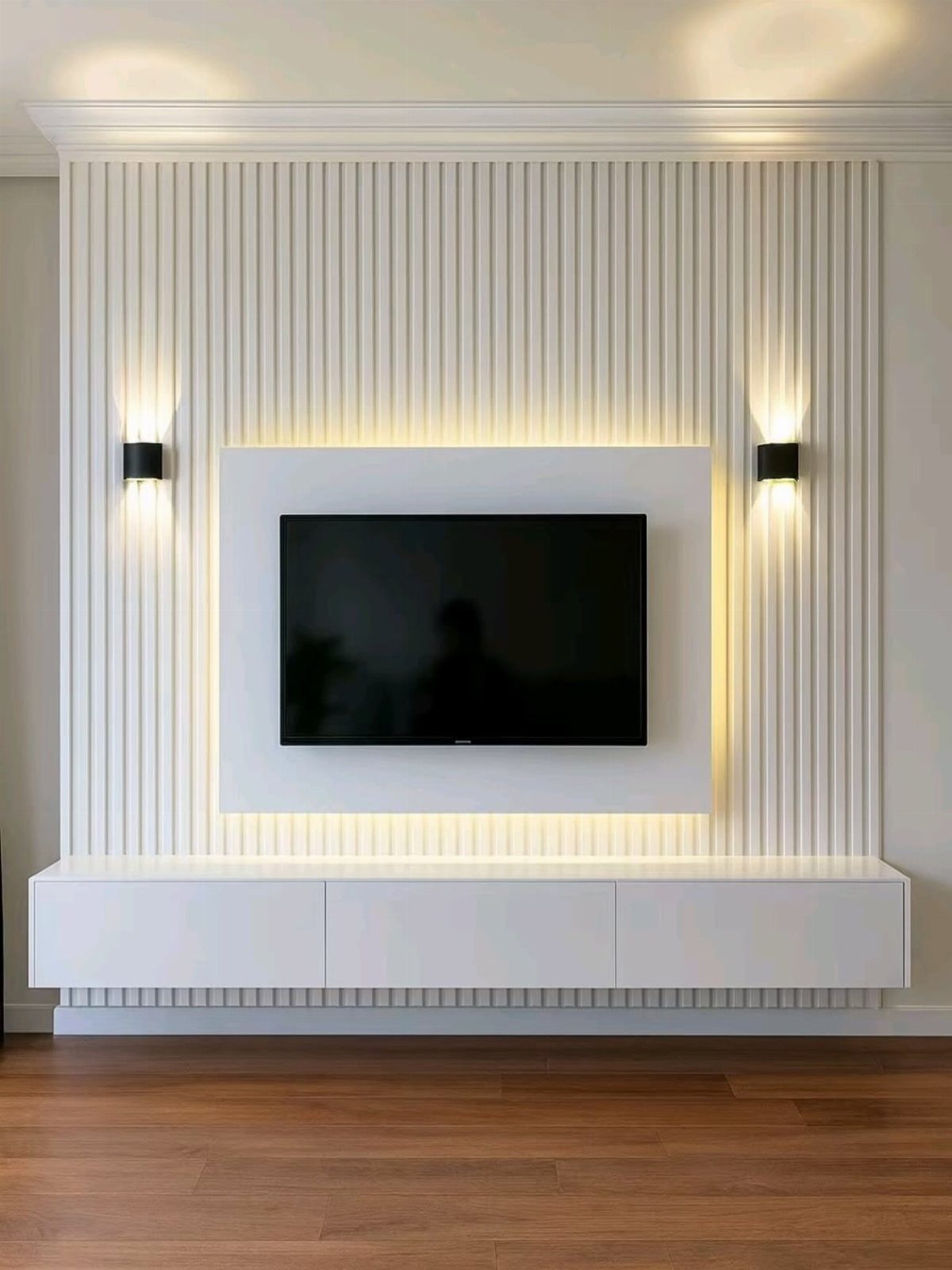 White slatted wood accent wall with a mounted TV and floating white console.