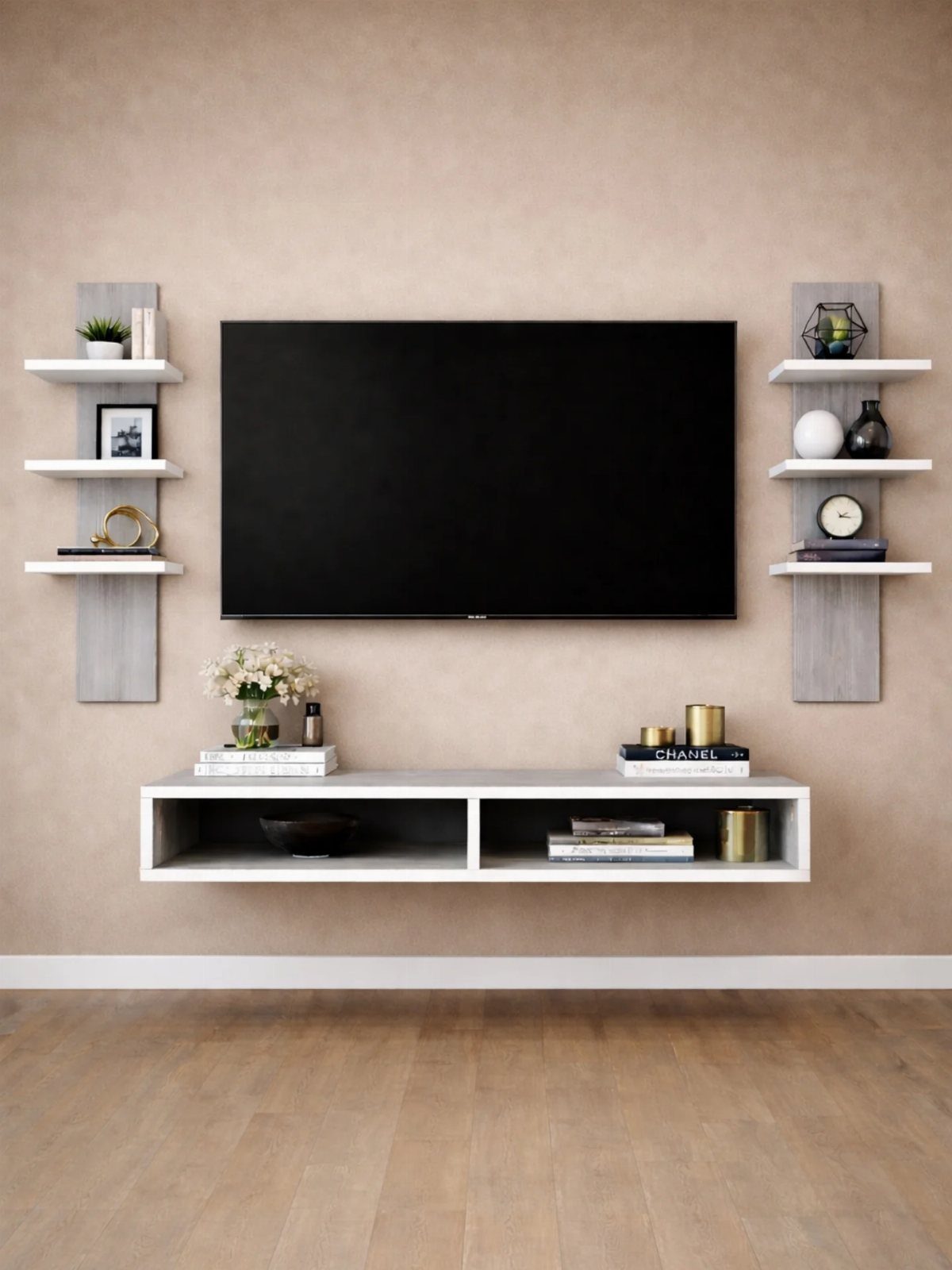 Black TV mounted on beige wall with white floating shelves on both sides.