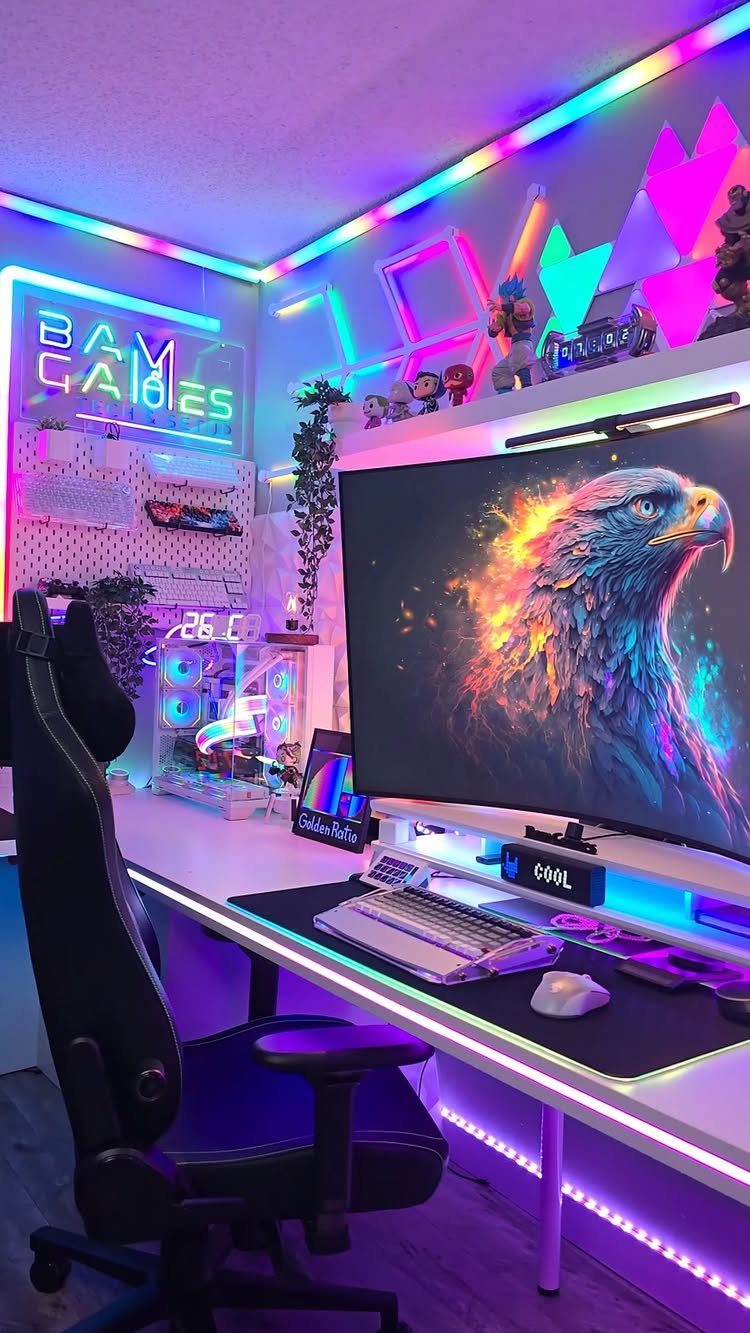 Gaming setup with neon wall signs, LED strips, and a curved monitor.