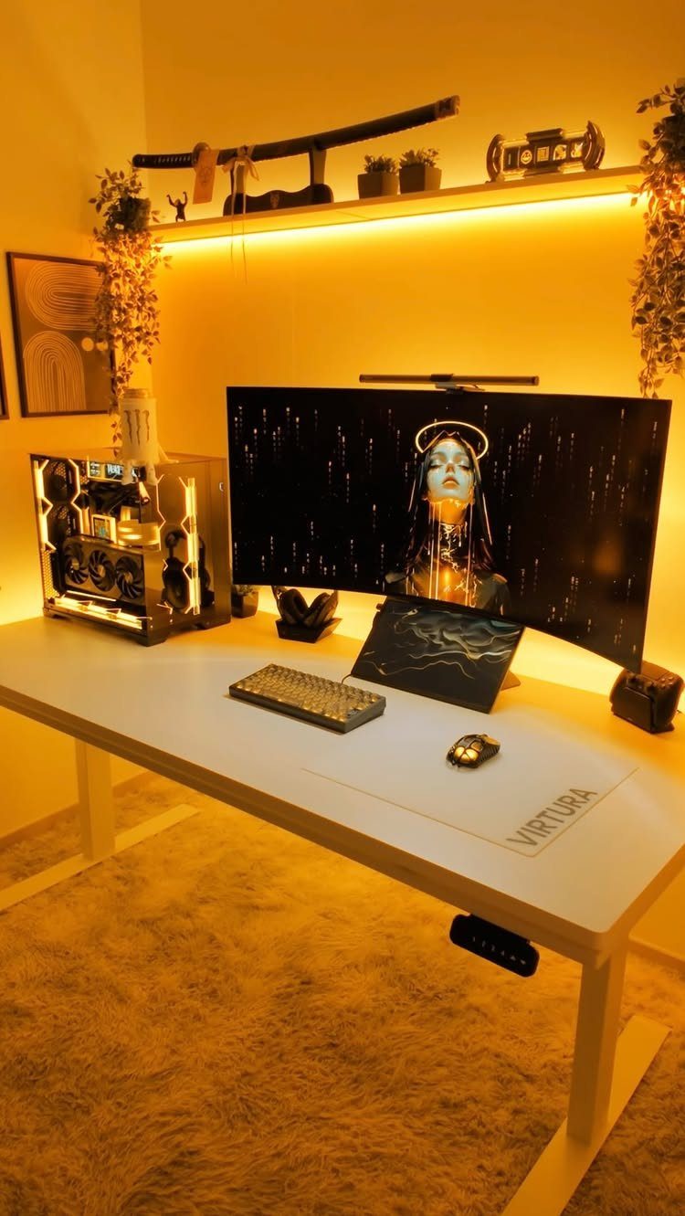 Gaming setup with a white desk and yellow walls illuminated by warm LED lighting.