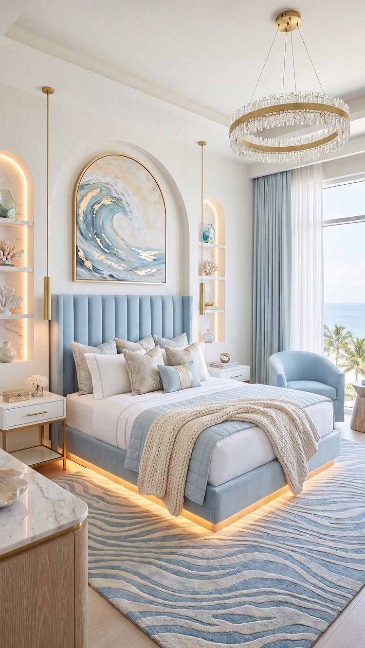 Arched blue wave painting hanging above a light blue tufted bed in bedroom