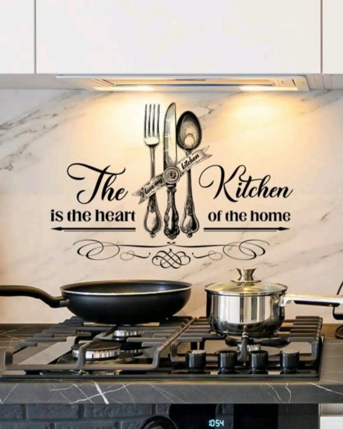 Kitchen wall decal with cutlery and text on a marble backsplash above a stove