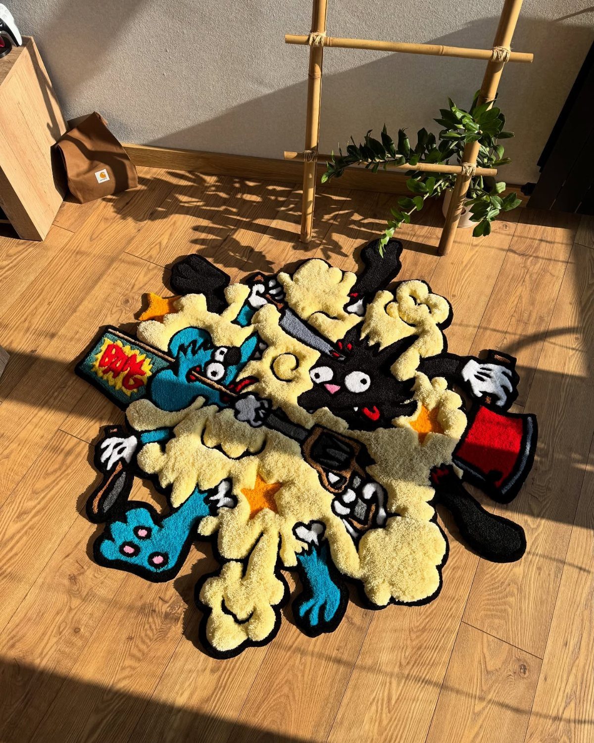 Custom tufted rug with colorful cartoon characters on a light wooden floor.