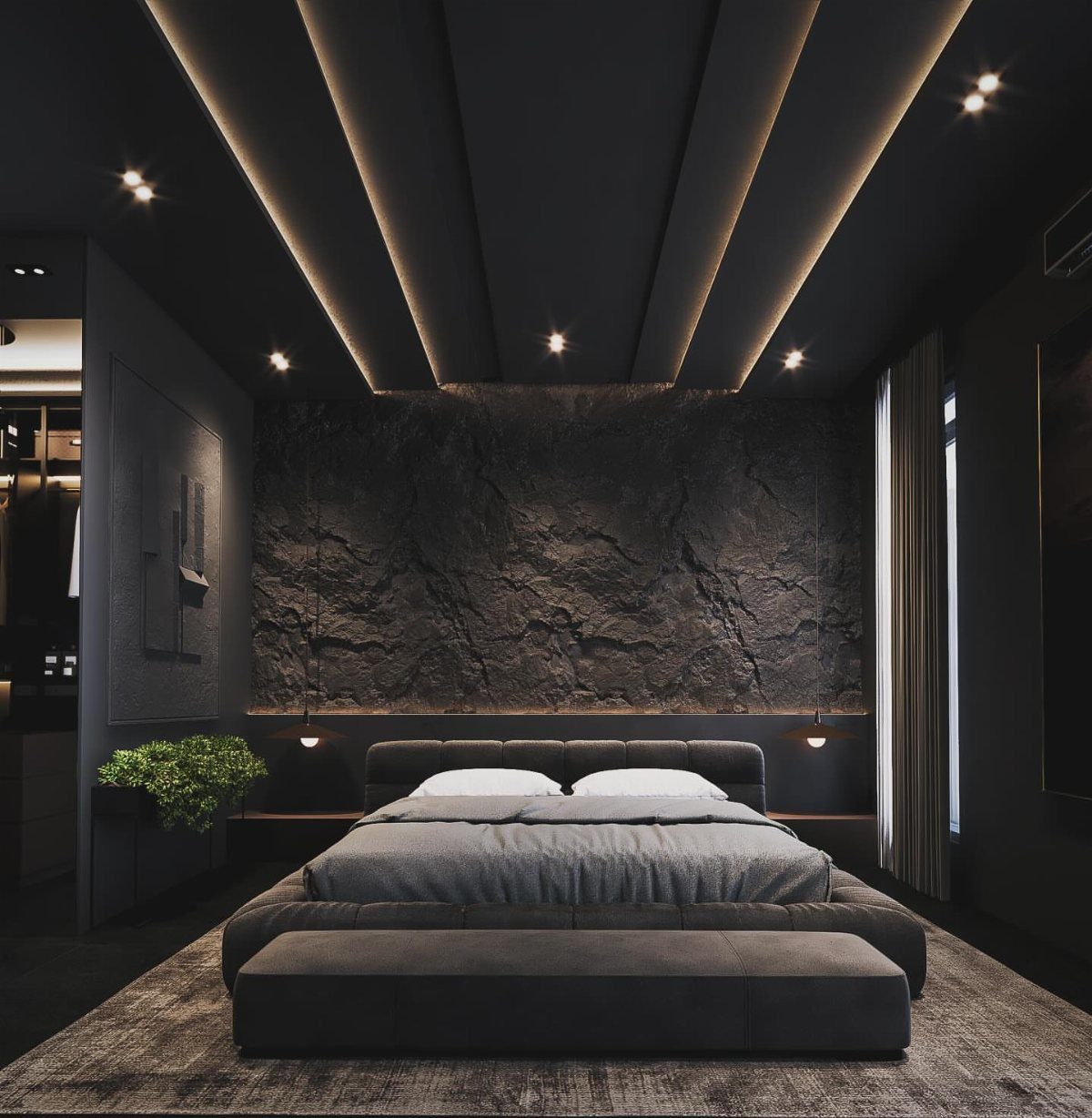 Modern bedroom with black ceiling, linear recessed lighting, and dark stone wall.