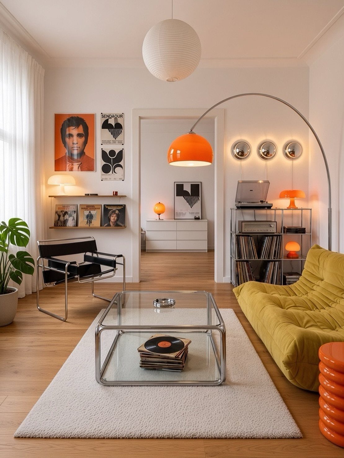 Mid-century modern living room with yellow sofa, black leather chair, and orange arc lamp.