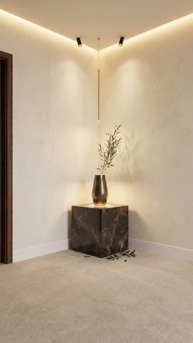 Marble pedestal with a vase of olive branches in a lit wall corner