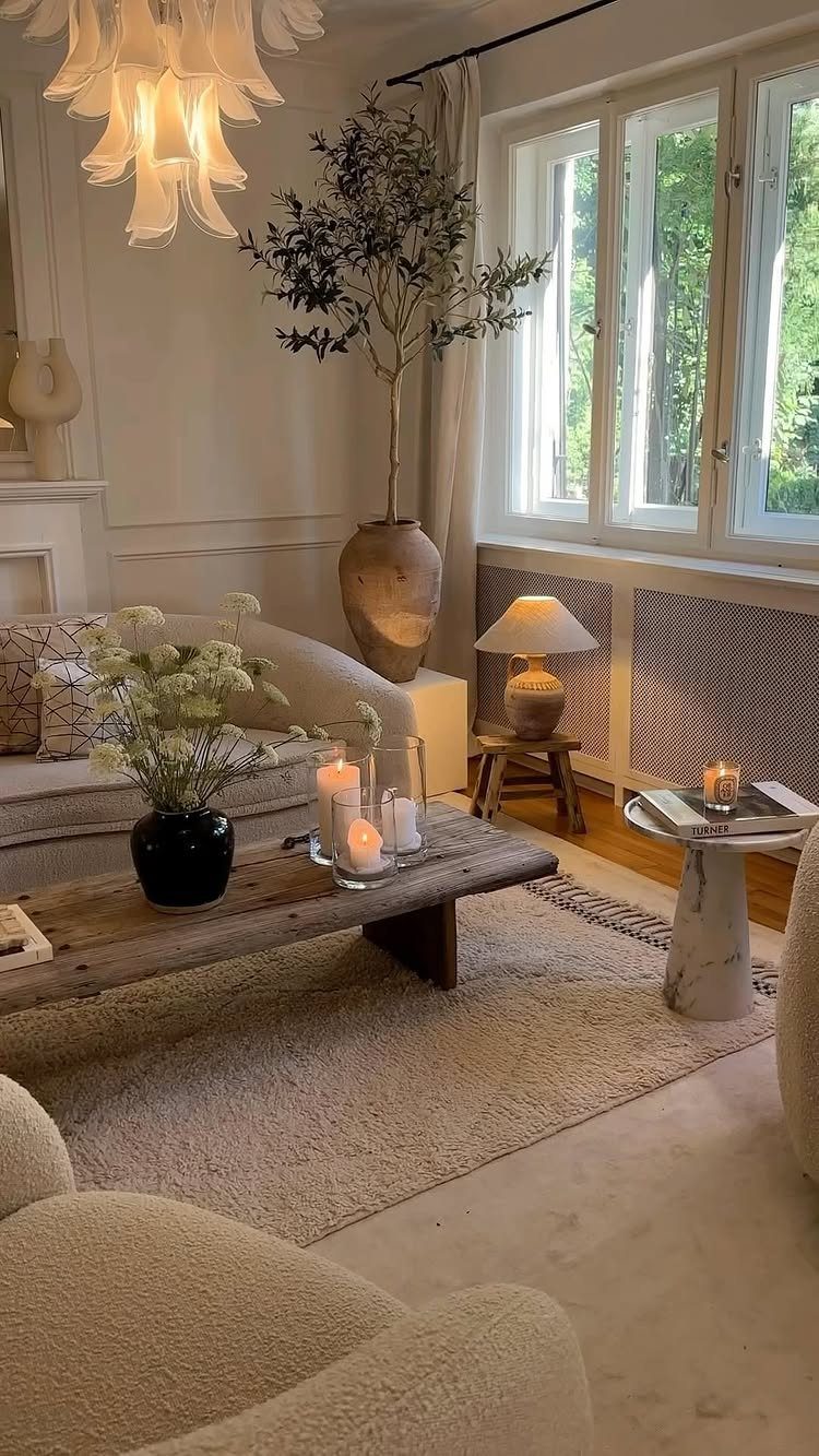 Cozy living room featuring a mix of warm beige and cool grey neutral tones.